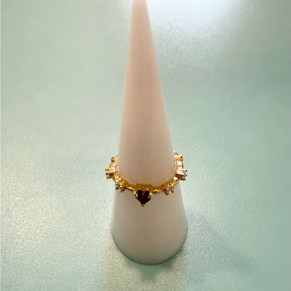 Cute gold ring with purple gem size 6